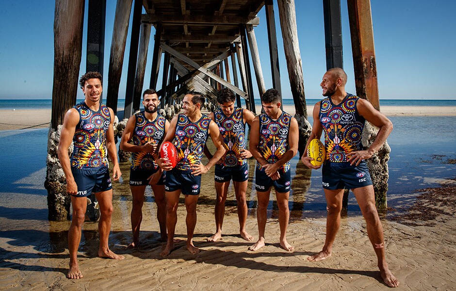 Adelaide Crows 2019 Indigenous Guernsey Adelaide Crows players Cameron Ellis-Yolmen, Ben Davis, Wayne Milera, Tyson Stengle, Eddie Betts and Shane McAdam wearing the 2019 Indigenous Guernsey at Grange Beach. The Indigenous Guernsey celebrates Aboriginal and Torres Strait Islander cultures and their contributions to Australian Football.